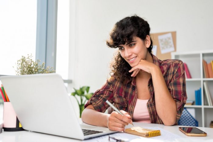 1_young woman doing research